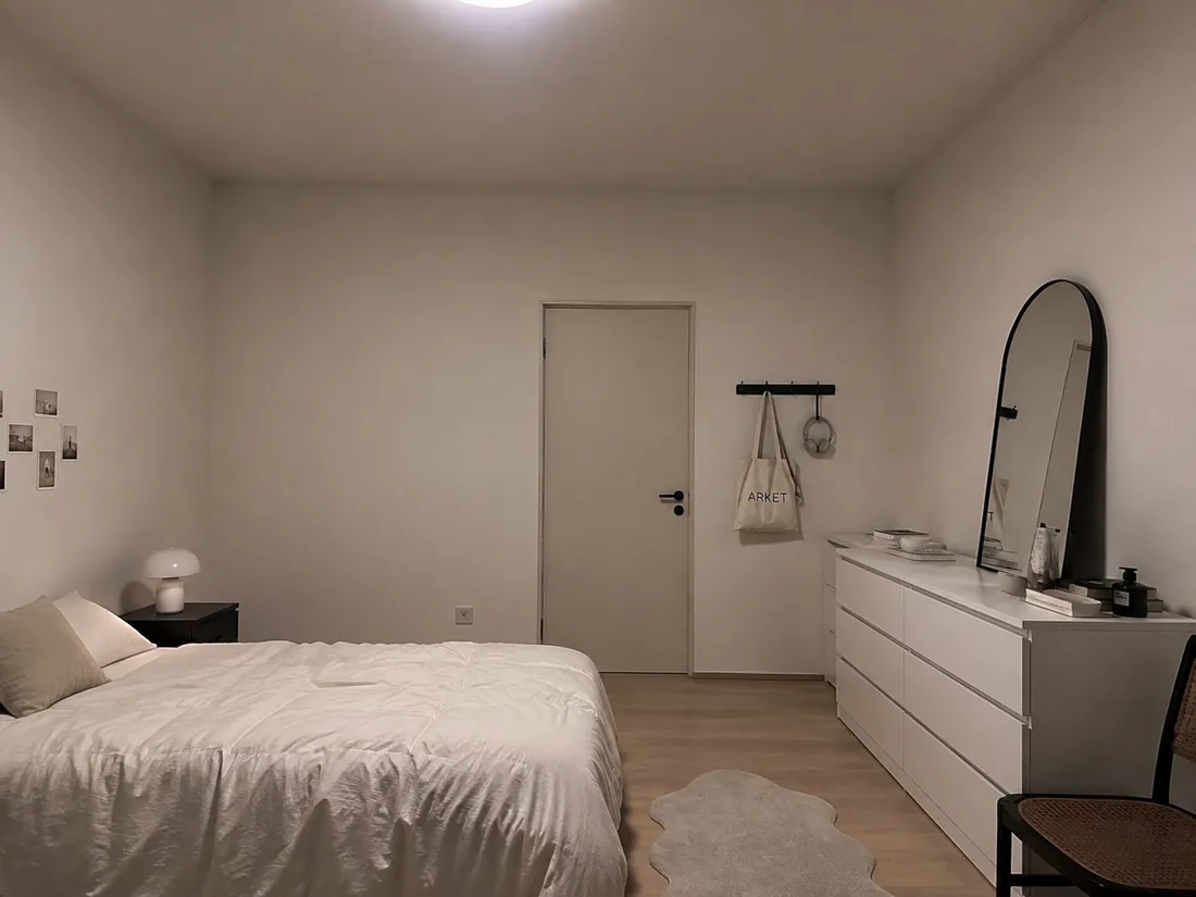 Before — the room under a cold ceiling light